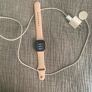 Apple Watch with peach band
